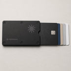 Metal Card Holder Black cards sliding out with the Smart Card Finder